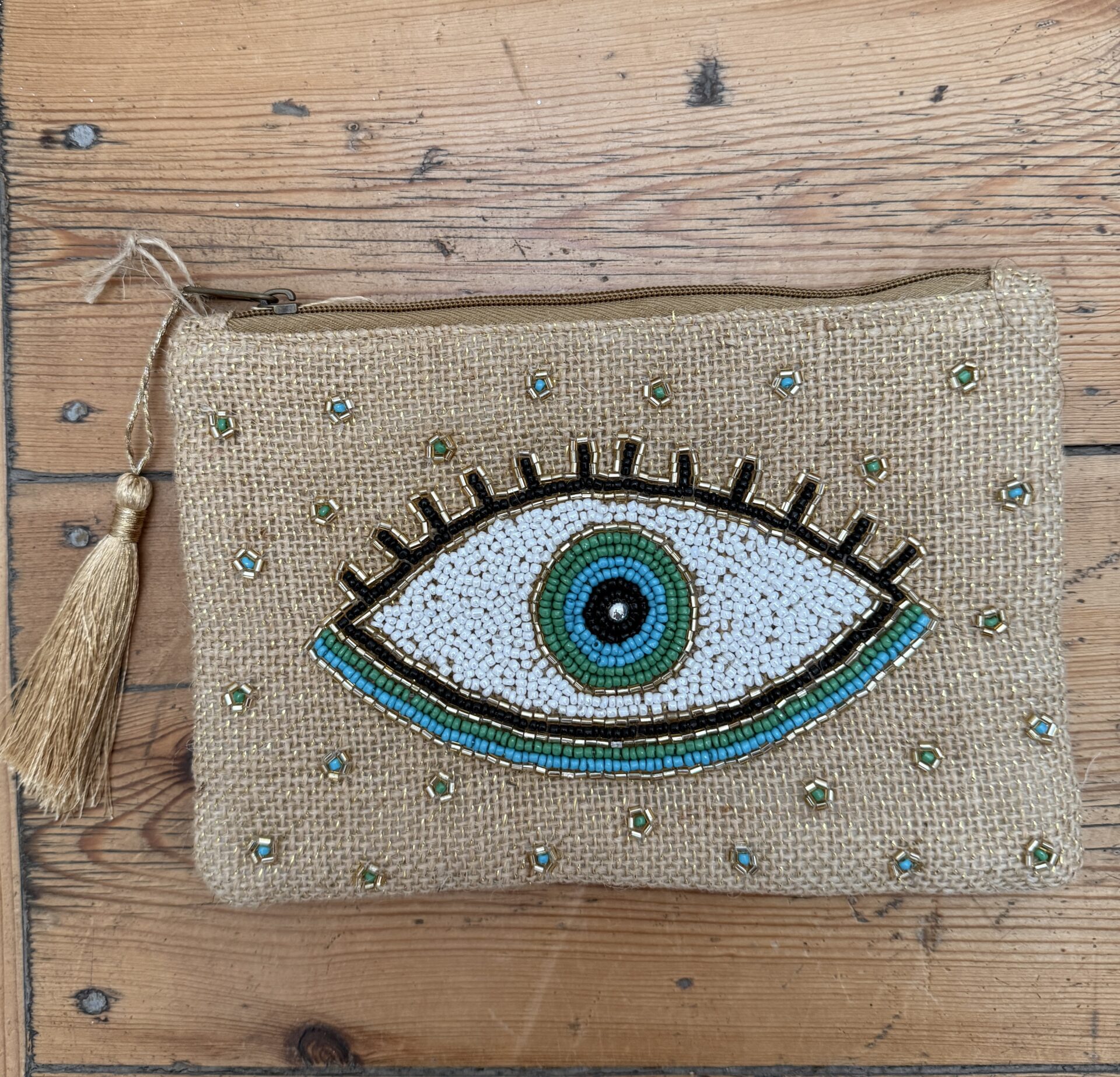 pochette oeil beige