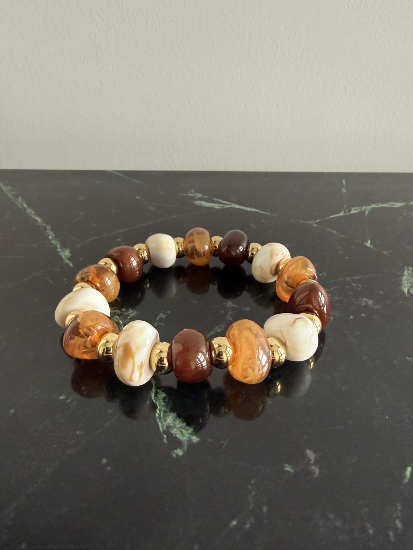 bracelet élastiqué écru doré
